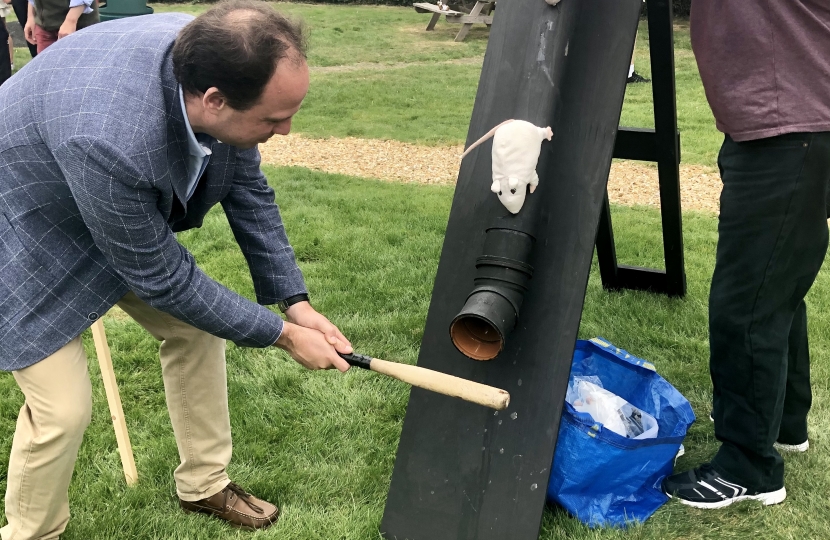 Greg enjoying 'splat the rat' at the opening of "The Park" in North Marston