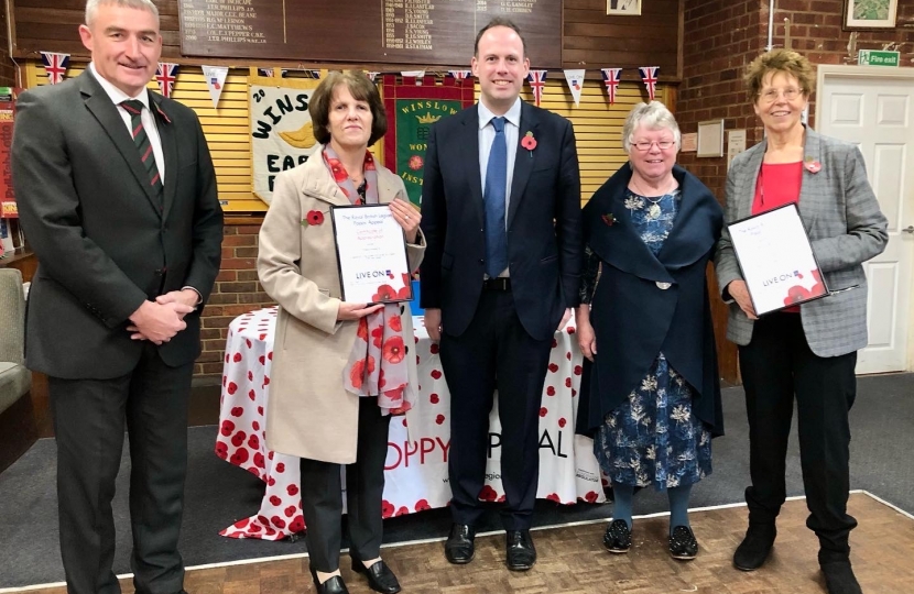 Greg presents Winslow WI and Winslow Earlybirds WI with certificates from the Royal British Legion