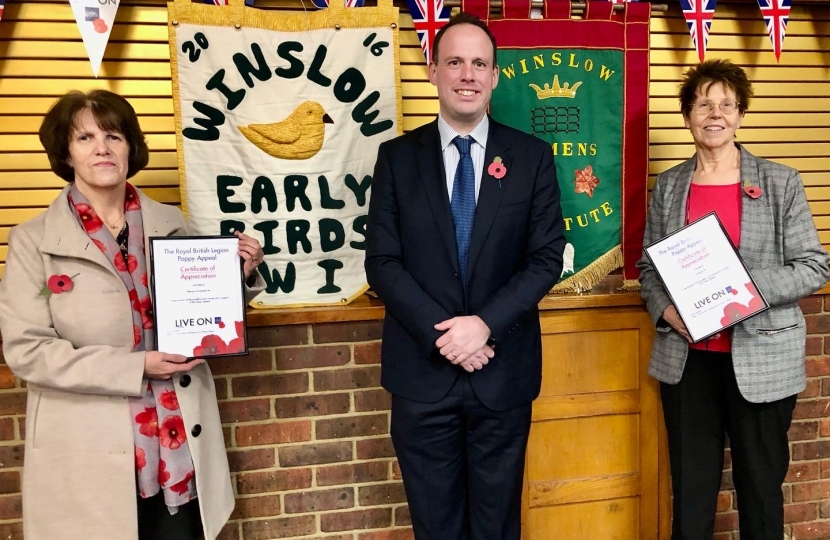 Greg presents Winslow WI and Winslow Earlybirds WI with certificates from the Royal British Legion