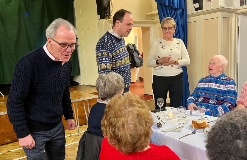 Greg chats to guests at the Steeple Claydon Seniors Christmas Dinner 2021.