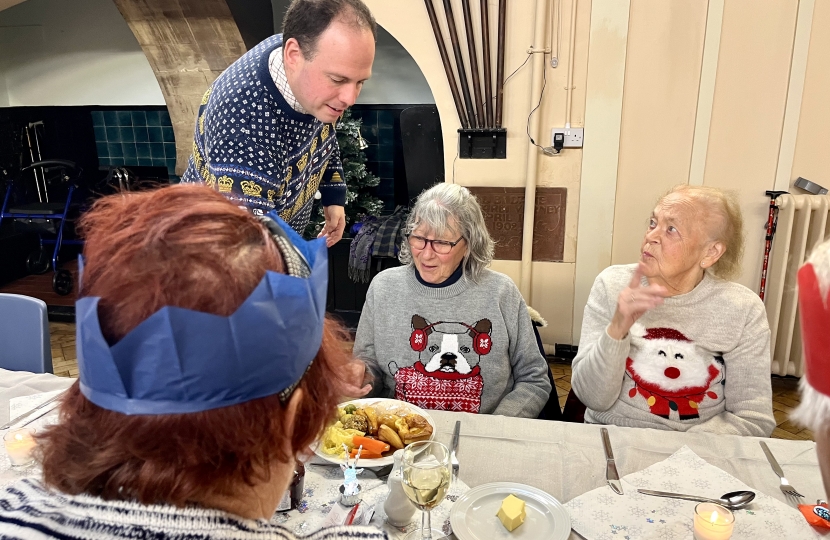 Greg volunteering at the Steeple Claydon Seniors Christmas Dinner 2021.