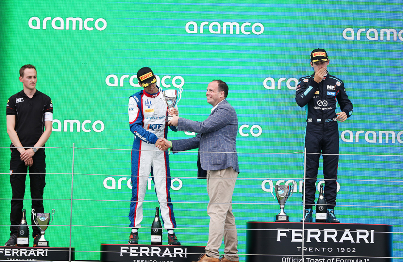 Greg presents 2nd place trophy in the Formula 3 sprint race podium.