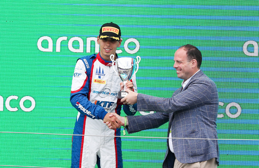 Greg presents 2nd place trophy in the Formula 3 sprint race podium.