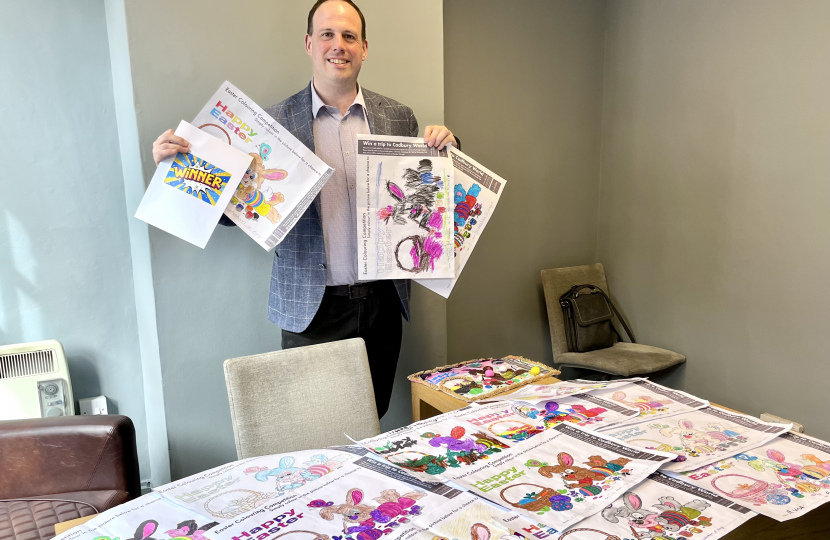 Greg judges Haddenham Easter Colouring Competition 