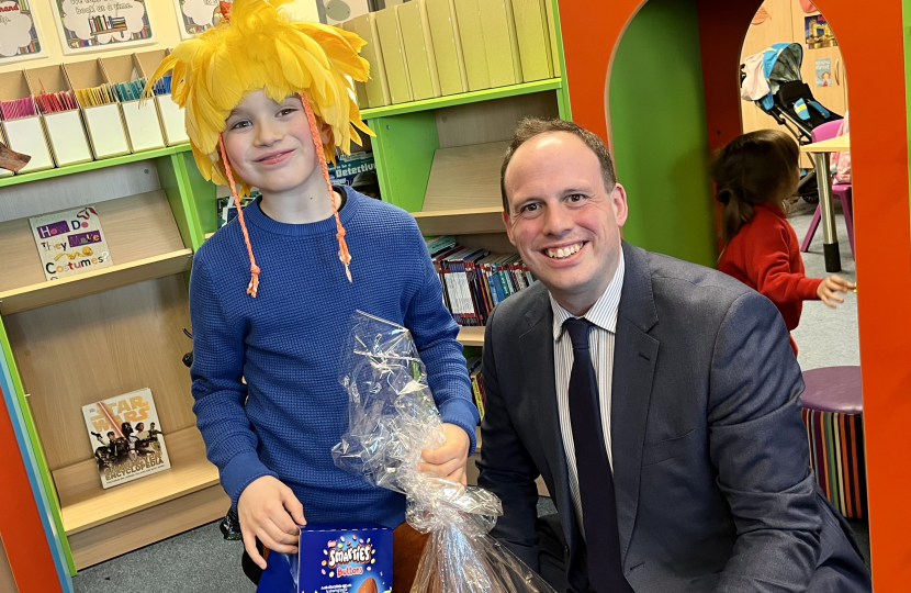 Greg awards prizes for Lace Hill Academy Easter Bonnet Competition