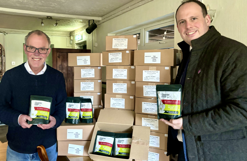 Greg delivering 25 boxes of donated pheasant casserole to Steeple Claydon.