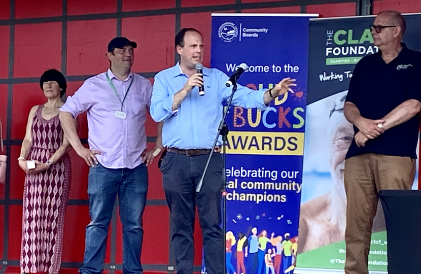 Greg presents Proud of Bucks Awards at Party in the Park