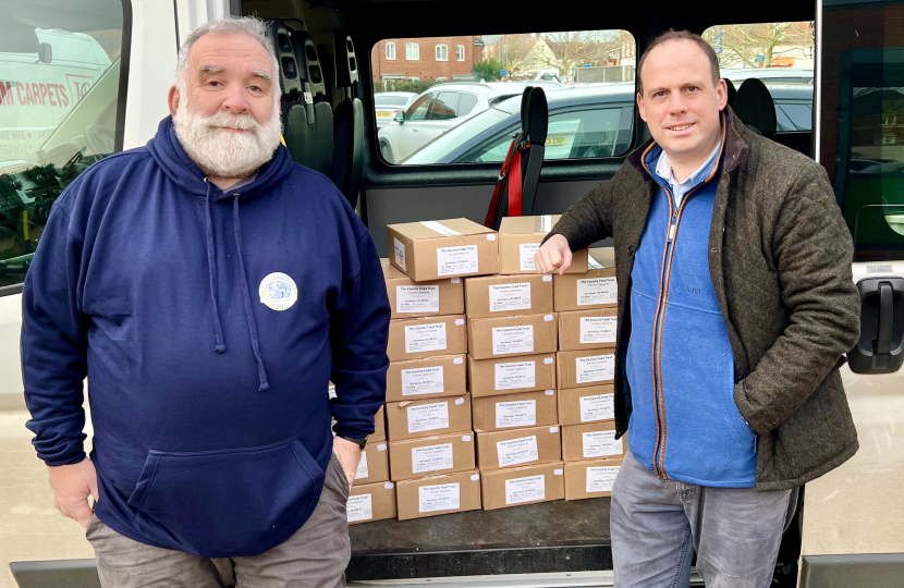 Greg delivering 25 boxes of donated pheasant casserole to Waddesdon.