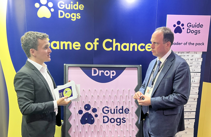 Greg Smith MP helps open doors for guide dogs