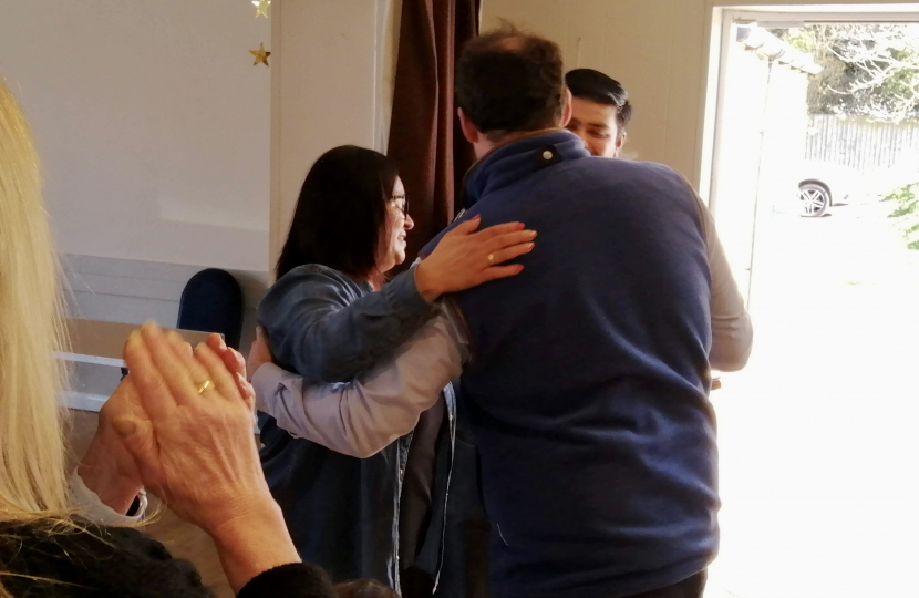 Greg presents Kay and Kavit with their thank you plaque.