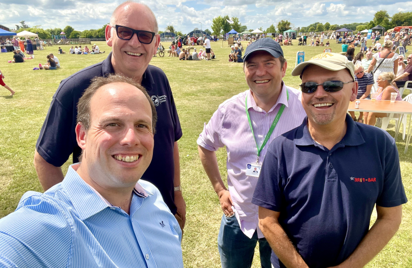 Greg presents Proud of Bucks Awards at Party in the Park