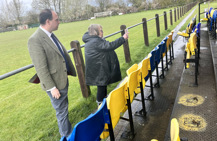 Greg sees the damage to the football seating.