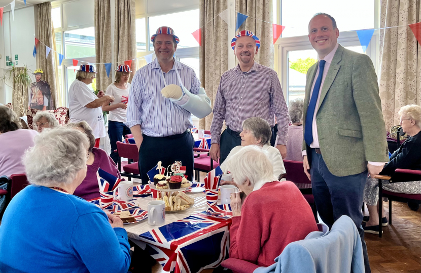 Greg helps out at over 65s Coronation tea at the Princes Centre