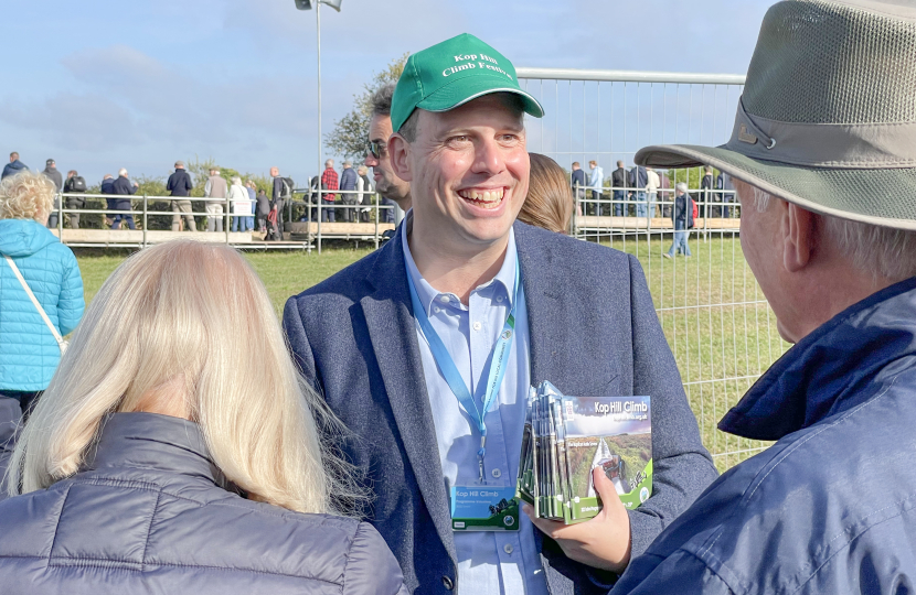 Greg selling programmes in aid of the Kop Hill Climb Fund which is distributed to Bucks charities