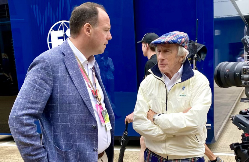 Greg with Sir Jackie Stewart.