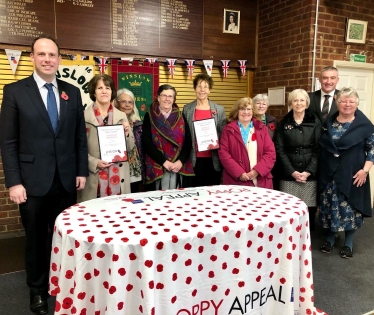 Greg presents Winslow WI and Winslow Earlybirds WI with certificates from the Royal British Legion