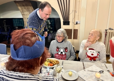 Greg volunteering at the Steeple Claydon Seniors Christmas Dinner 2021.