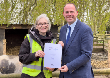 Greg presents Jane Scott at Curly Tails with Points of Light Certificate