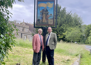 Greg with the Earl of Buckinghamshire and the restored sign.